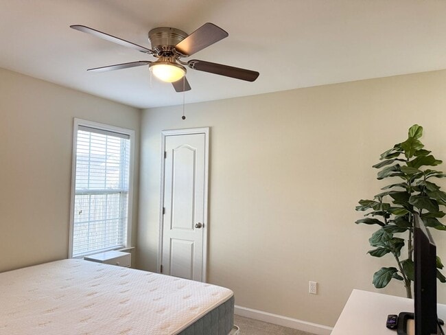 Building Photo - Spacious 3BR Home with Open Split Layout, Fenced Yard & Covered Front Porch