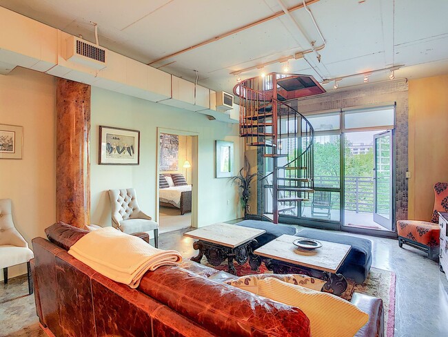 Building Photo - Stunning 4 Bedroom Multi-Level Loft Condo ...