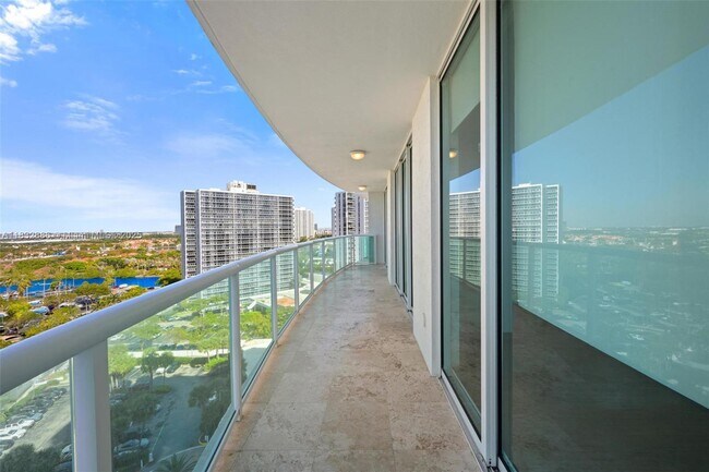 Building Photo - 20201 E Country Club Dr