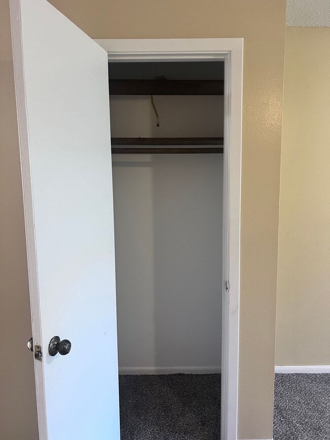 Building Photo - Introducing a 2-bedroom, 1.5-bathroom condo that offers the perfect blend of comfort and convenie...