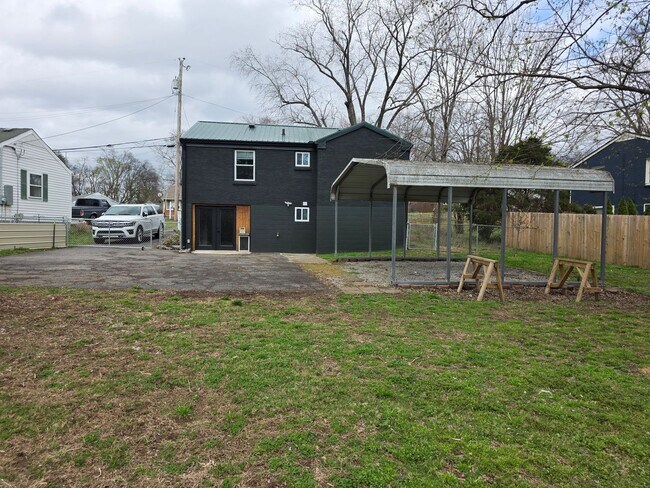 Building Photo - Charming 2BR with Walk-Out Basement, Fenced Yard & Flexible Murphy-Bed Office