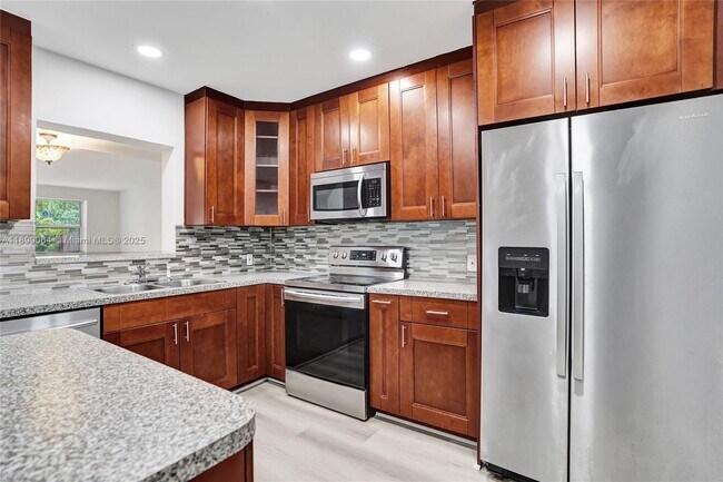 Building Photo - 6860 SW 18th Ct