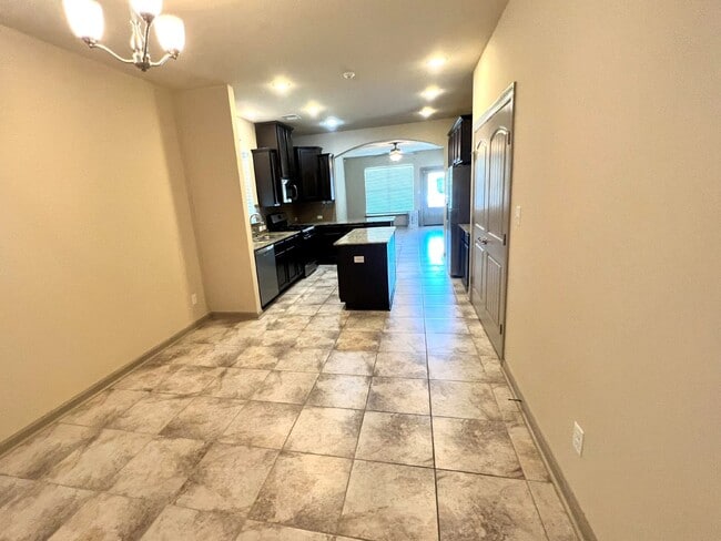 Building Photo - "Desirable 3-Bedroom Home with Guest Suite in Pelican Lakes - A Must-See Rental Property!"