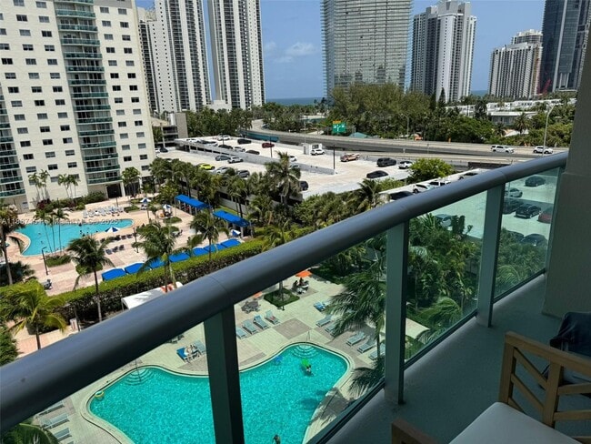 Building Photo - 19380 Collins Ave