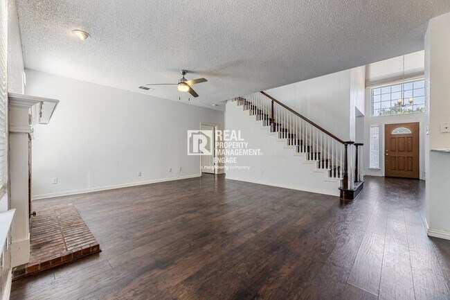 Building Photo - Recently Updated Plano Property with Modern Features and Serene Surroundings