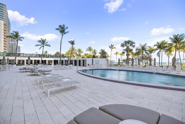 Building Photo - 10155 Collins Ave