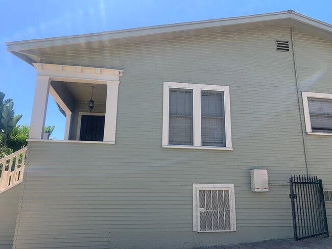 Building Photo - Fully gated Charming craftsman Two bedroom...