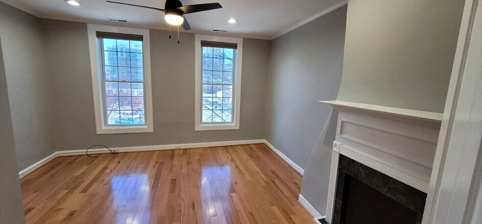 Living rm with view of city skyline - 715 S Bond St