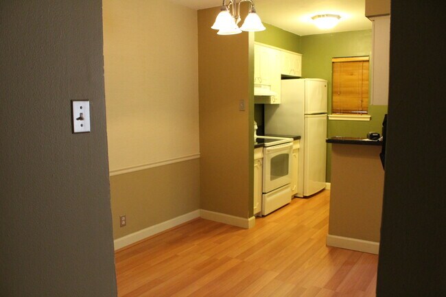 Building Photo - *COMING SOON* MOVE IN SPEICAL Upstairs Condo with Premium Amenities & Hardwood Floors!