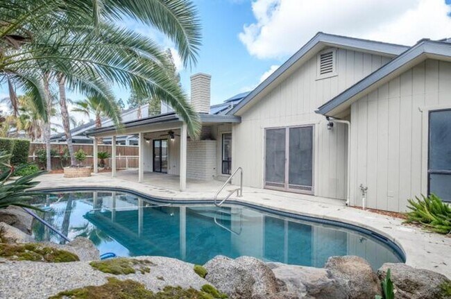 Building Photo - Drench Yourself in Luxury: 3-Bedroom Corner Oasis with a Sparkling Pool!