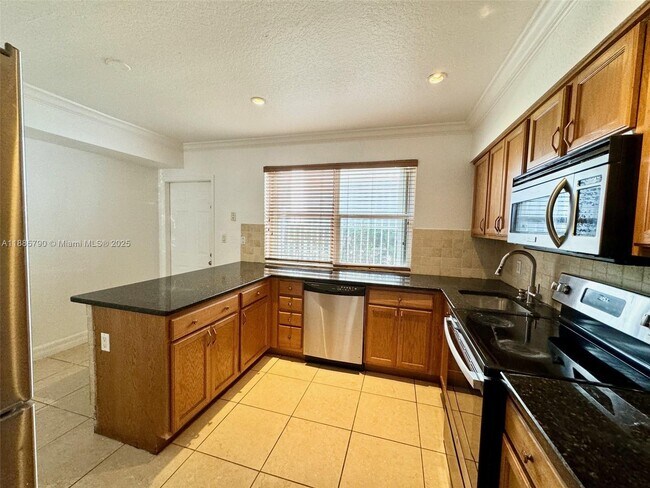Building Photo - 7801 Hispanola Ave
