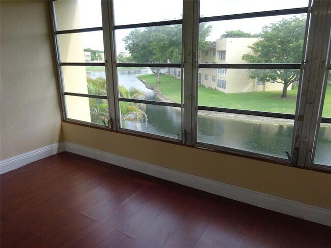 Building Photo - 6050 NW 64th Ave