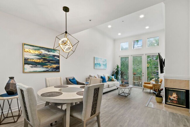 Building Photo - Elegant Furnished Penthouse Retreat with Treetop Views