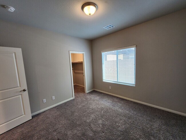 Building Photo - A Fairly New Home with 5 Bedrooms in a gated community