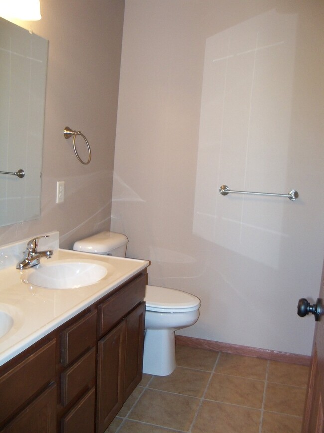 Building Photo - 2 BED | 2 BATH | DOUBLE GARAGE | TOWNHOME ...