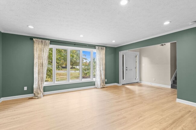 Building Photo - AVAILABLE NOW! Waterfront Living in Carmel! Paddle boat included!