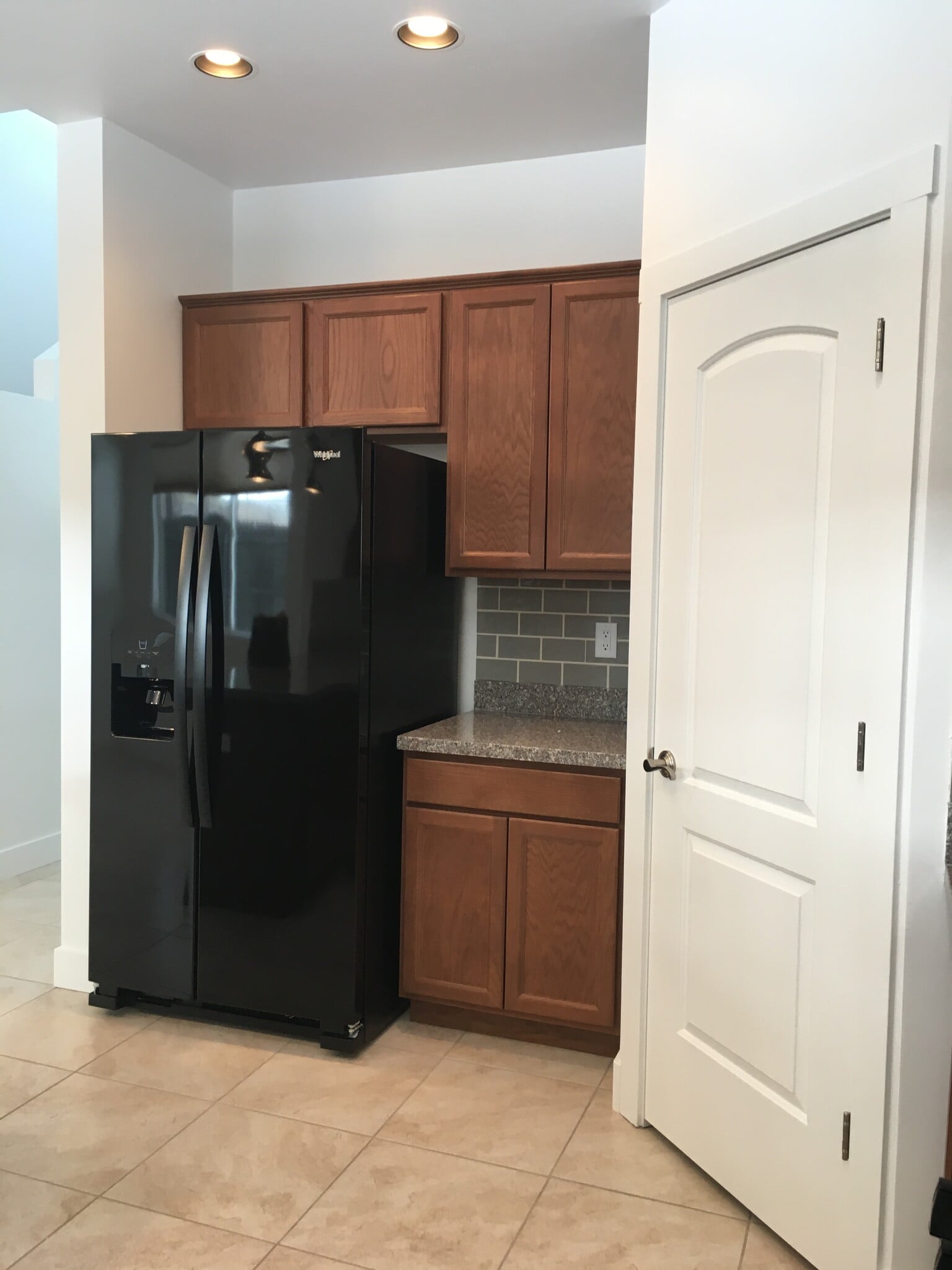 New fridge with additional cabinetry shown - 2317 W Mission Timber Cir
