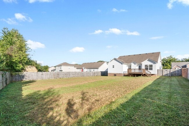 Building Photo - Pet Friendly Three Bedroom with Bonus!