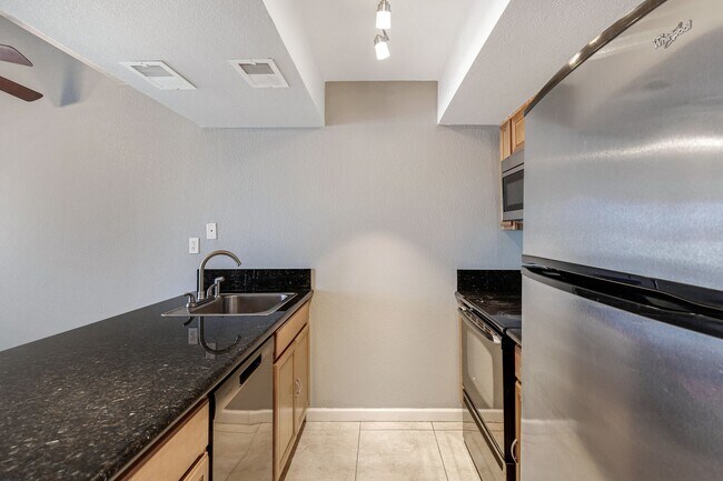 Building Photo - Upgraded Condo with Elegant Features and Convenient Location