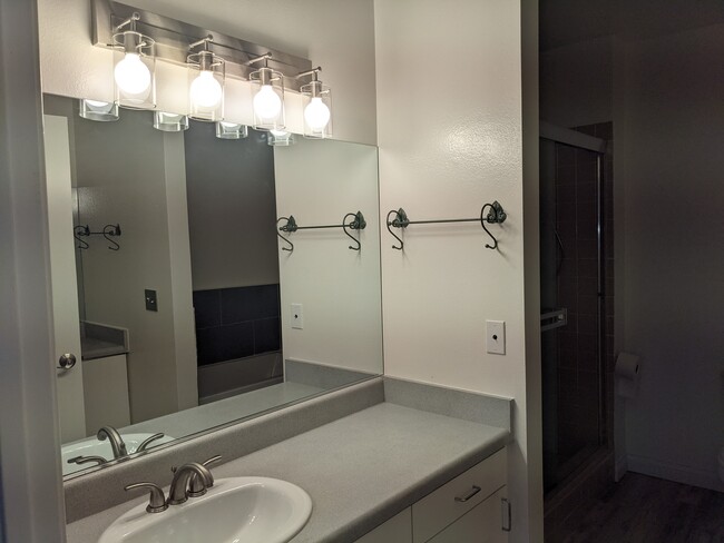 Master bathroom, two sinks across from each other. - 2491 Purdue Ave