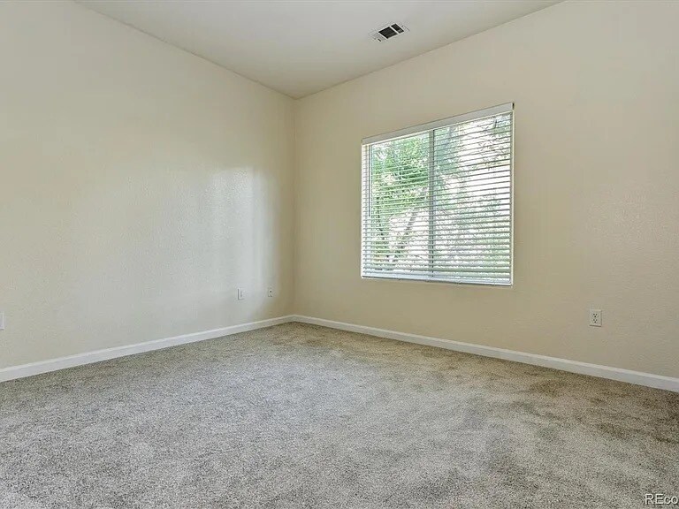 Building Photo - 7459 S Alkire St