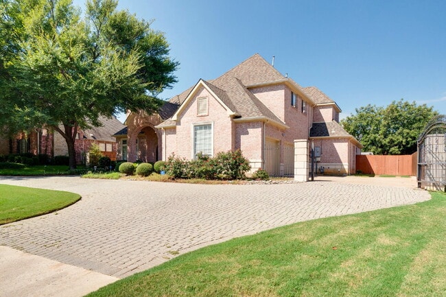 Building Photo - "Stately Gated 5-Bedroom Estate With Pool, Custom Details & Abundant Living Space!"