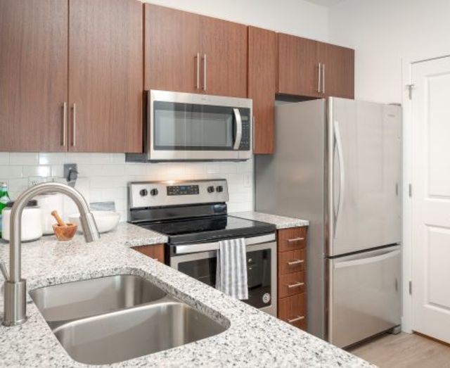 Stainless Steel Sink With Faucet - Parc on 5th Apartments & Townhomes