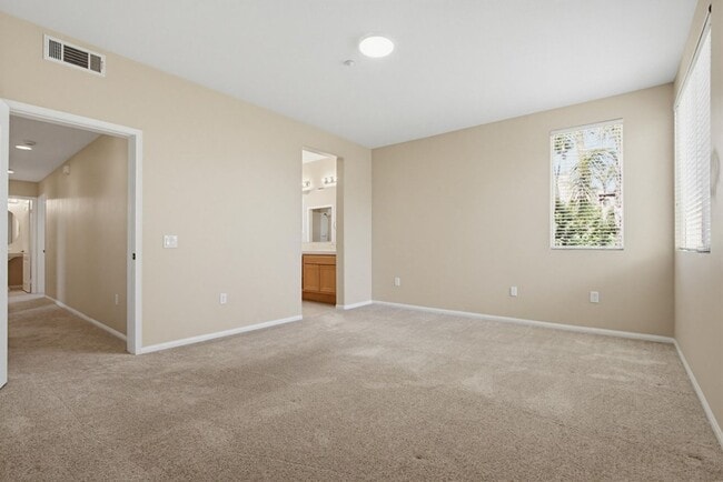 Building Photo - Carlsbad Condo West of 5 Freeway with Lagoon Access - Available Now!