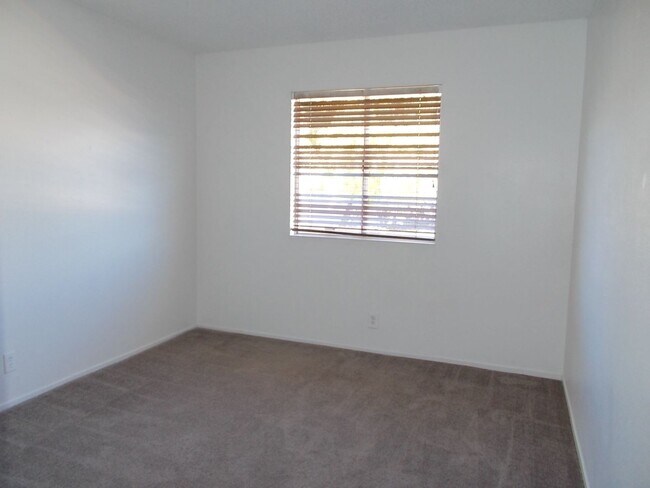 Building Photo - 4-Bedroom Home with Spacious Backyard