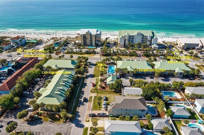 Building Photo - Beautifully furnished 2B/2B condo steps from Gulf of Mexico available for long term lease!
