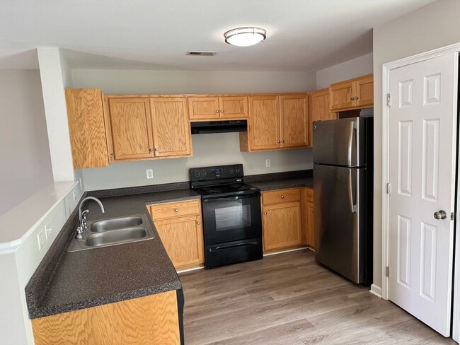 Building Photo - Nice townhouse duplex in convenient Kannap...