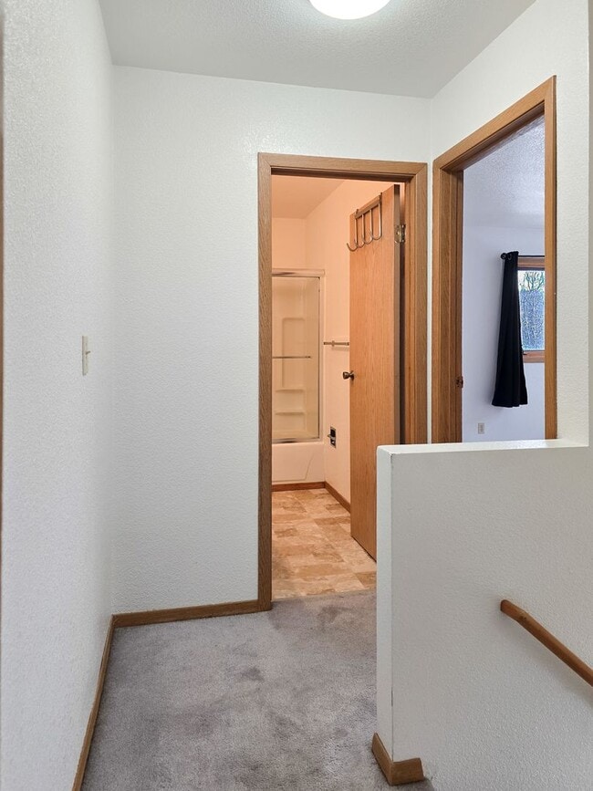 Building Photo - Right on the river! 2 Bedroom, 1.5 Bath, W/Garage, Duplex!