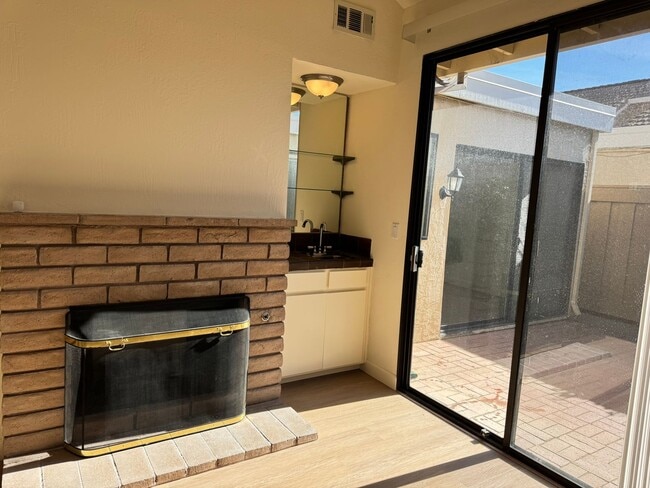 Building Photo - Tastefully updated 2 bedroom/2 bath, single level townhome w/attached 2 car garage!