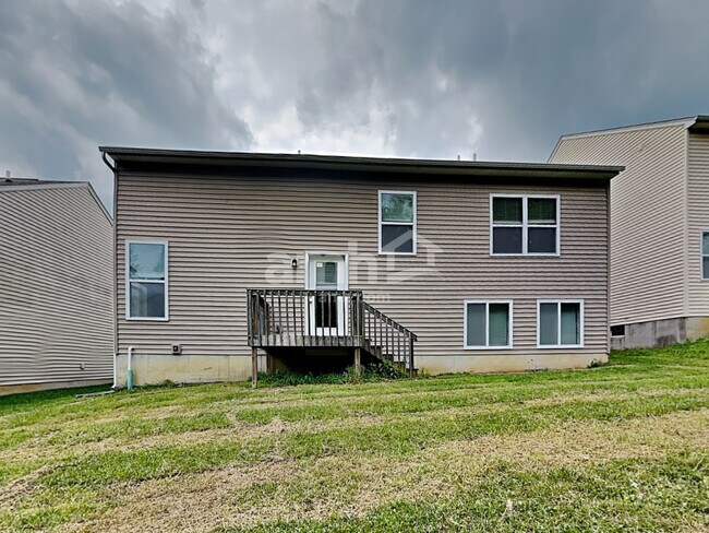 Building Photo - 9770 Soaring Breezes