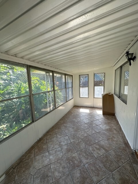 Wonderful, large screened in patio facing nature! - 5545 1/2 Allott Ave