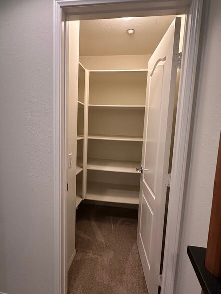 Extra storage closet at the top of the stairs inside unit - 5053 Plaza Promenade