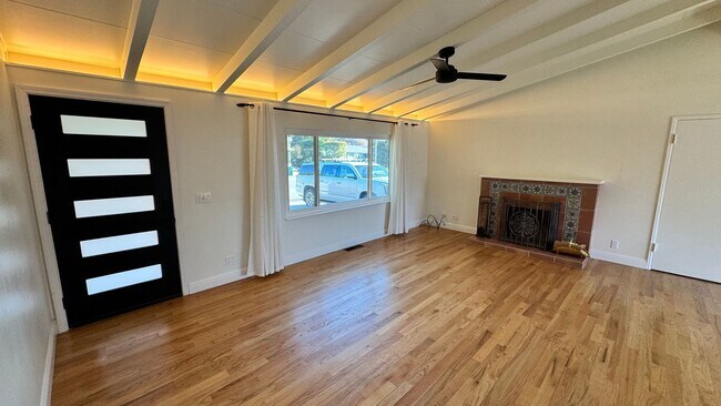 Building Photo - Mission Fields Home, 3 bedroom 2 bath, Fire Place, large fenced yard, 2 car garage fully finished...