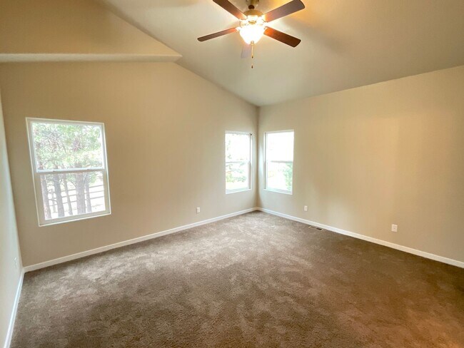 Building Photo - 4 Bedroom Home Available Near Woodmoor Dr ...