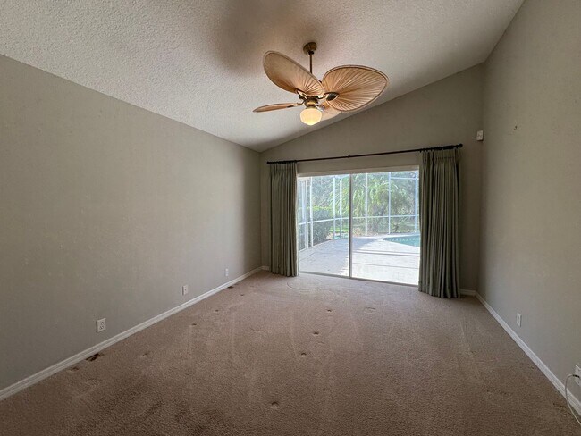 Building Photo - 4 Bedroom 2 Bathroom + Den - Attached Garage and  Heated  Pool!