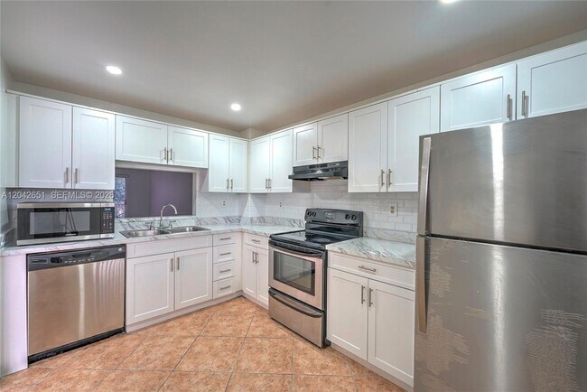 Building Photo - 1200 NW 87th Ave