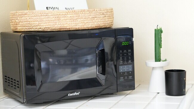 Common appliances such as refrigerator, stove, oven, and microwave are located in the kitchen. - 4160 Barrett Rd