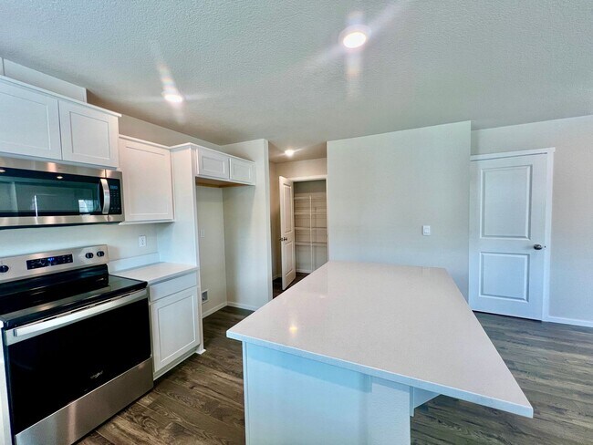 Building Photo - Prairie area- location… Brand new communit...