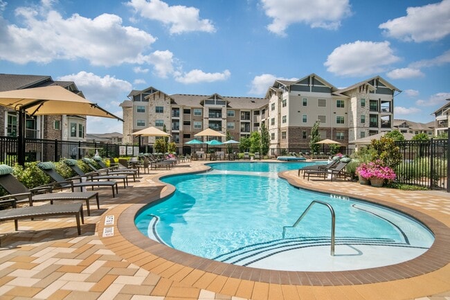 Resort-Style Pool Area - The Adley Craig Ranch Apartments