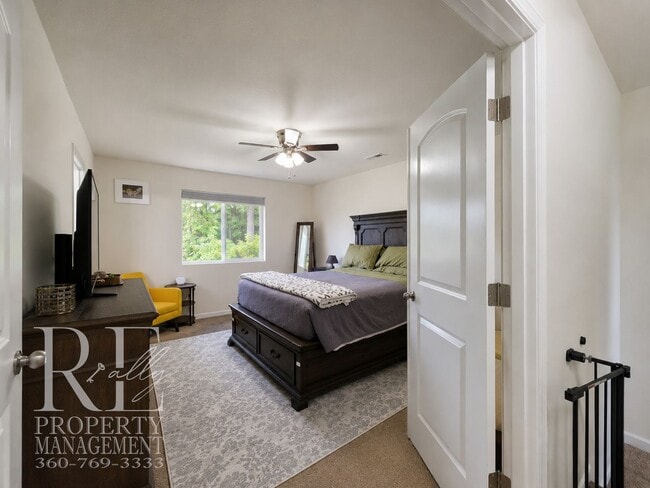 Building Photo - Spacious 3-Story Home with Flexible Living Space, Heat Pump & Private Deck Retreat