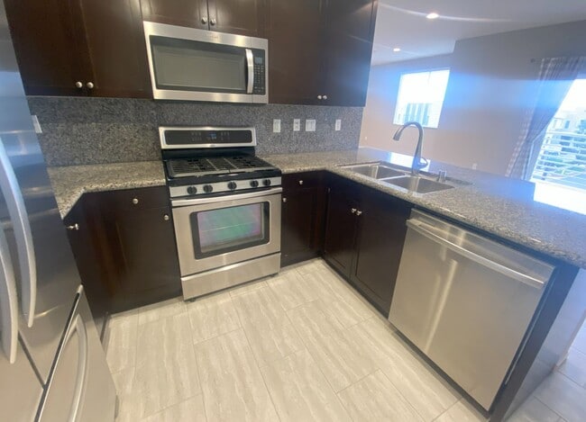 Building Photo - Coming soon - Single-Level 2-Bedroom Condo in the Prestigious South Bay 360 Community!