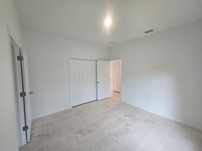 Building Photo - Brand New 2/2/1- SW Lehigh Acres