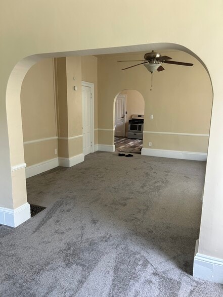 From living room into dining room room and kitchen area - 828 N 3rd St