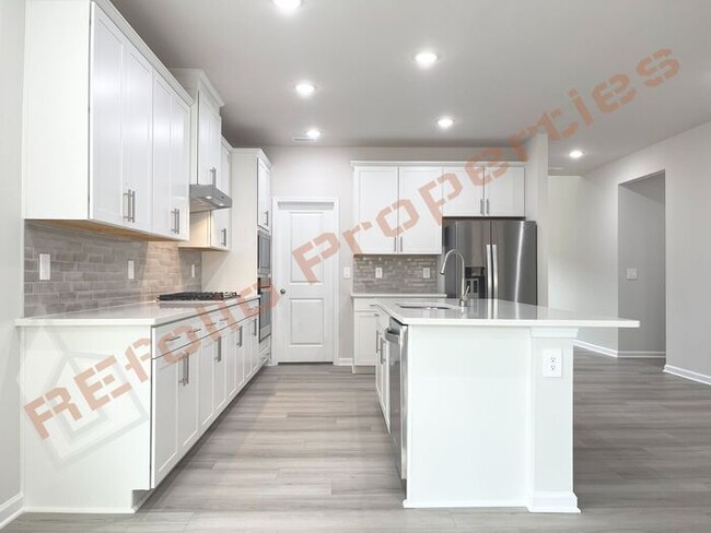 Building Photo - Beautiful Brand New 4 Bedroom, 2.5 Bathroo...