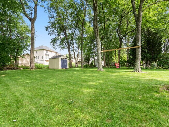 Building Photo - Beautifully Updated Home with Finished Lower Level, Fenced Yard & Exceptional Outdoor Living