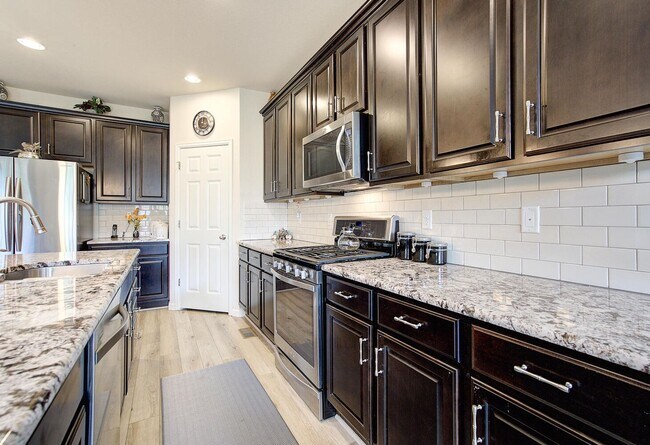Building Photo - Bright, Spacious & Full of Charm Inside an...